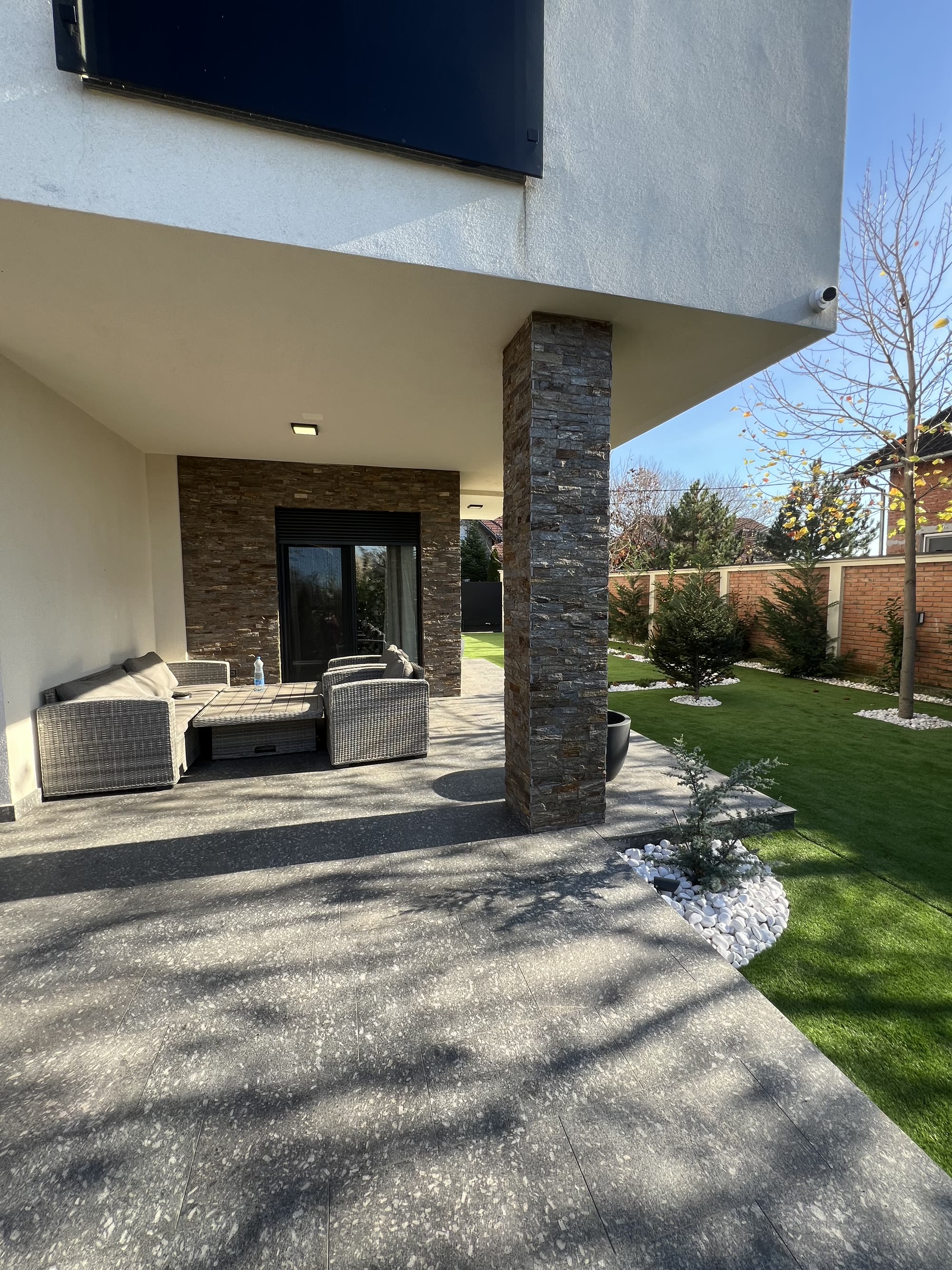 Covered loggia and walled garden